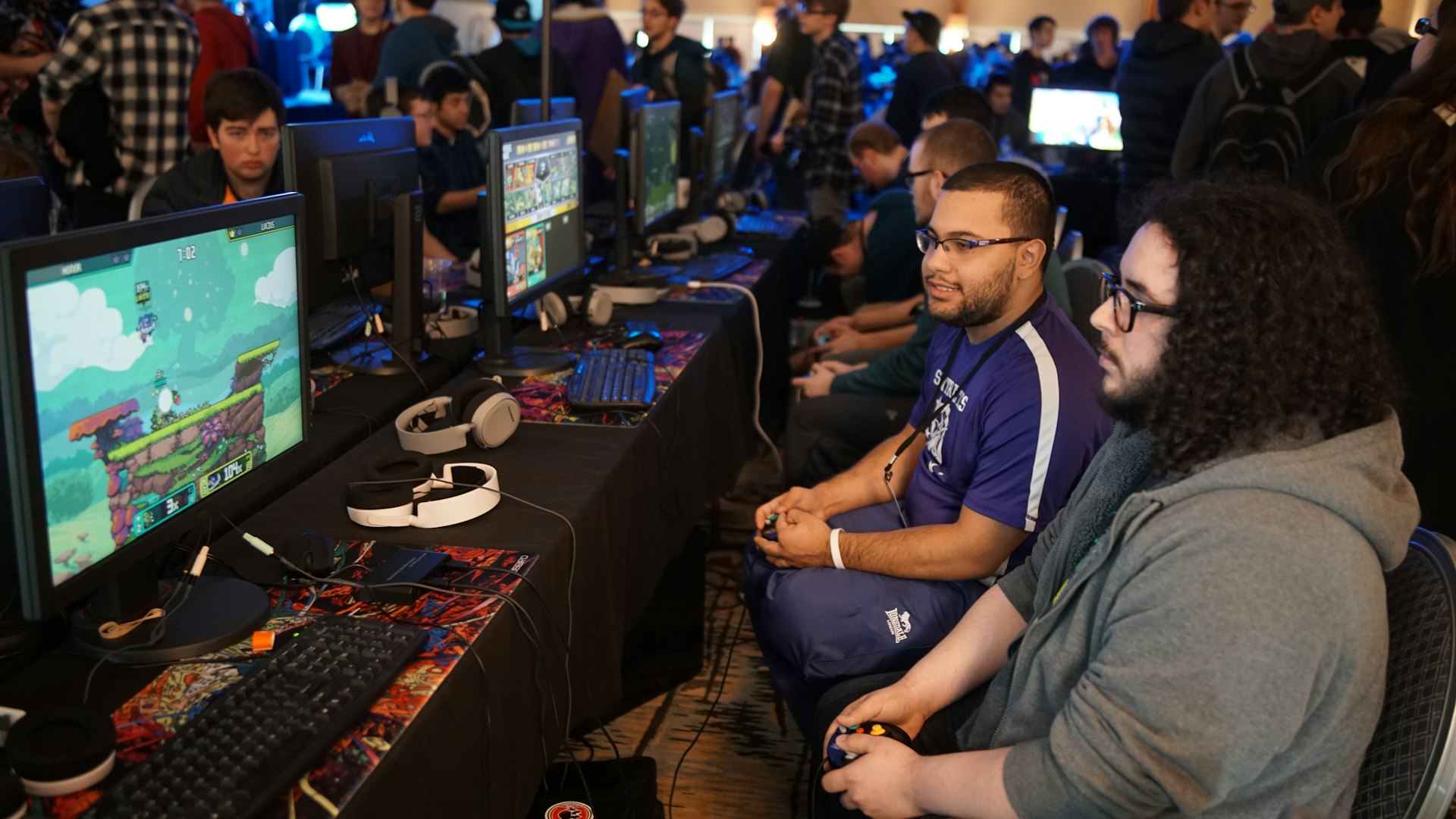 Competitive gaming team at their stations during a live match